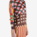 Pink shirts worn by a person, showing the shirts fit