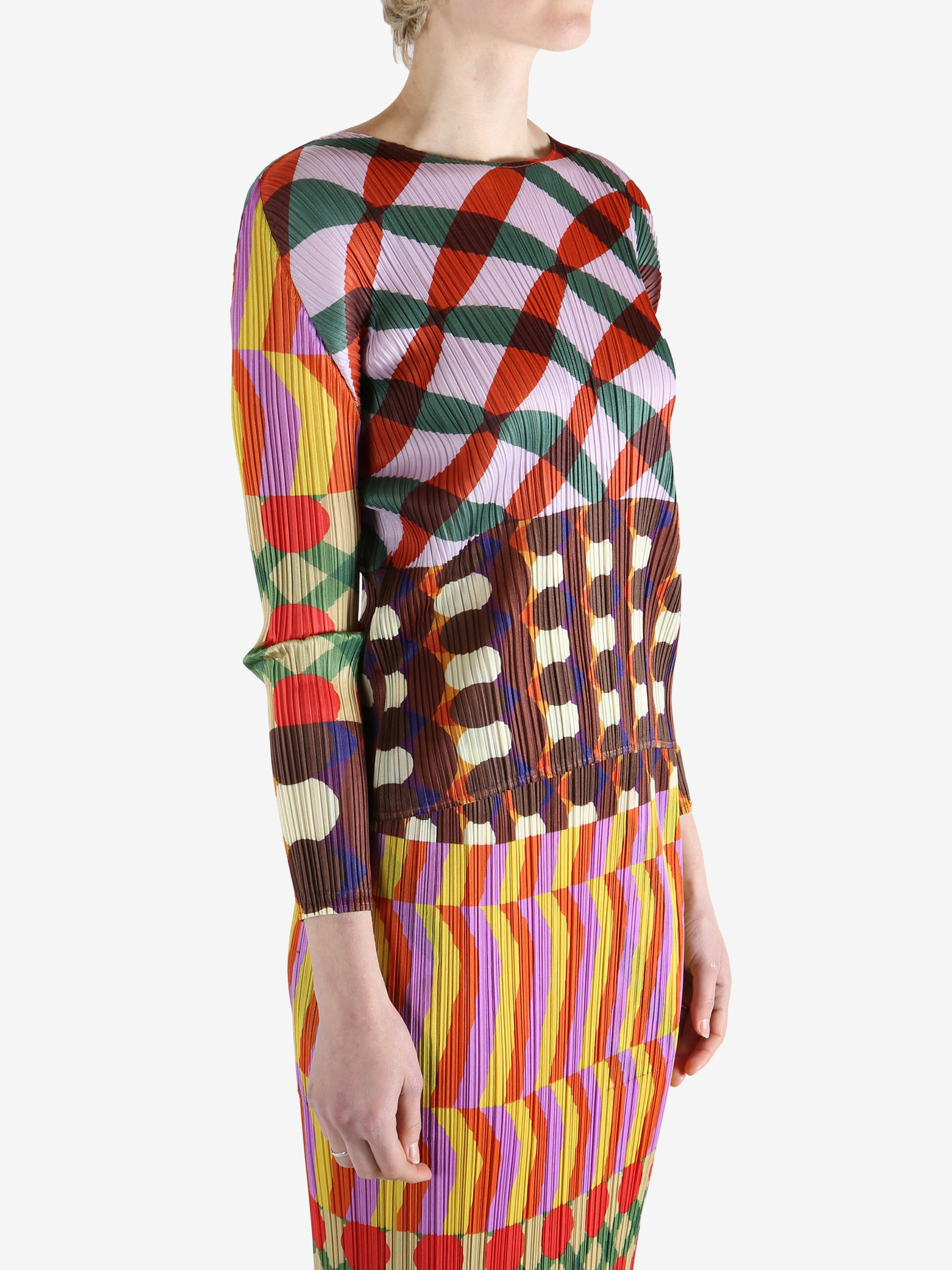 Pink shirts worn by a person, showing the shirts fit