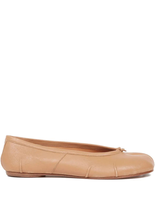Tan flats, side view