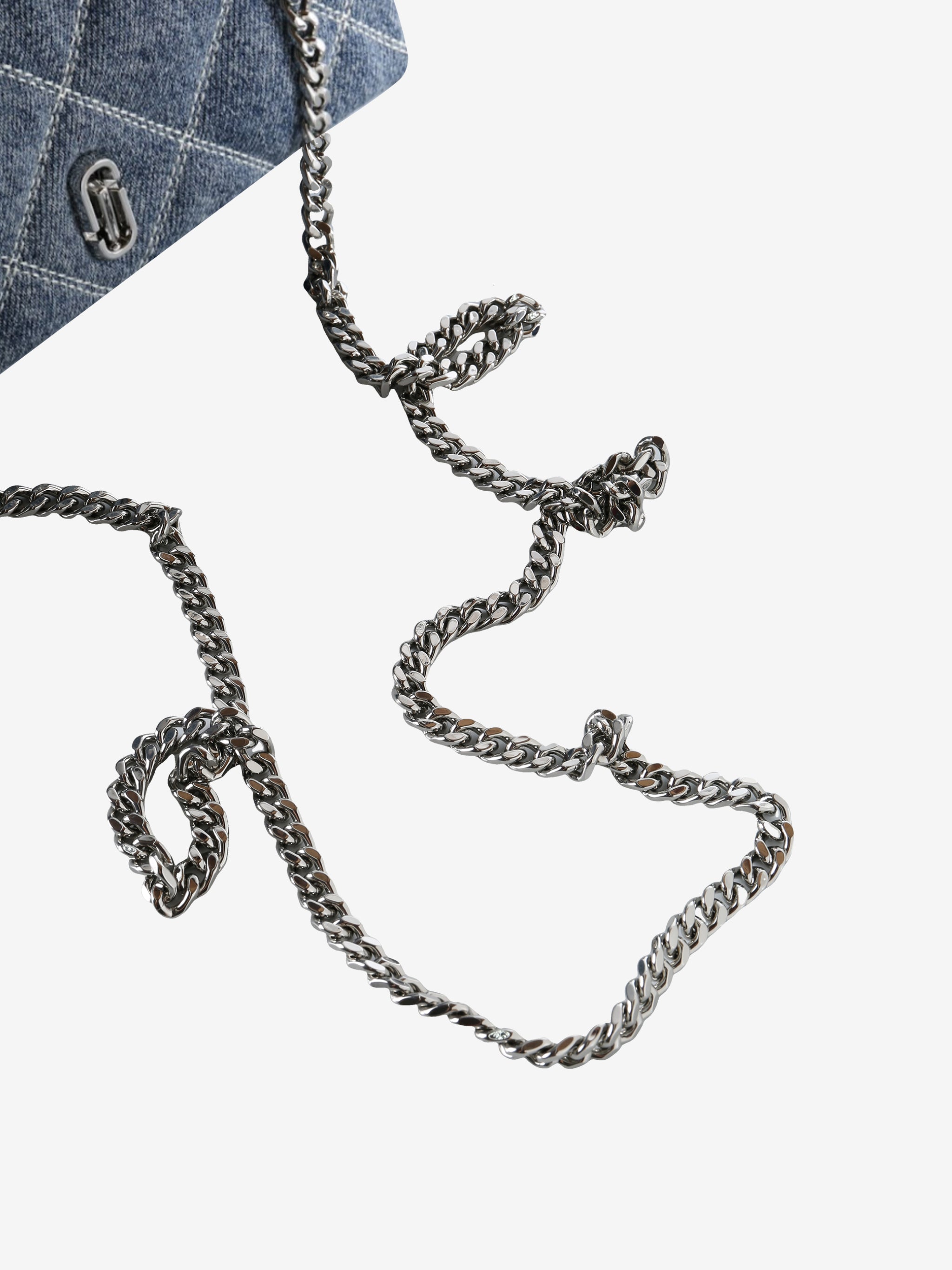 Close up of blue bag, showing texture of the cotton fabric