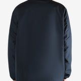 Navy cardigan worn by a person, showing the cardigan's fit