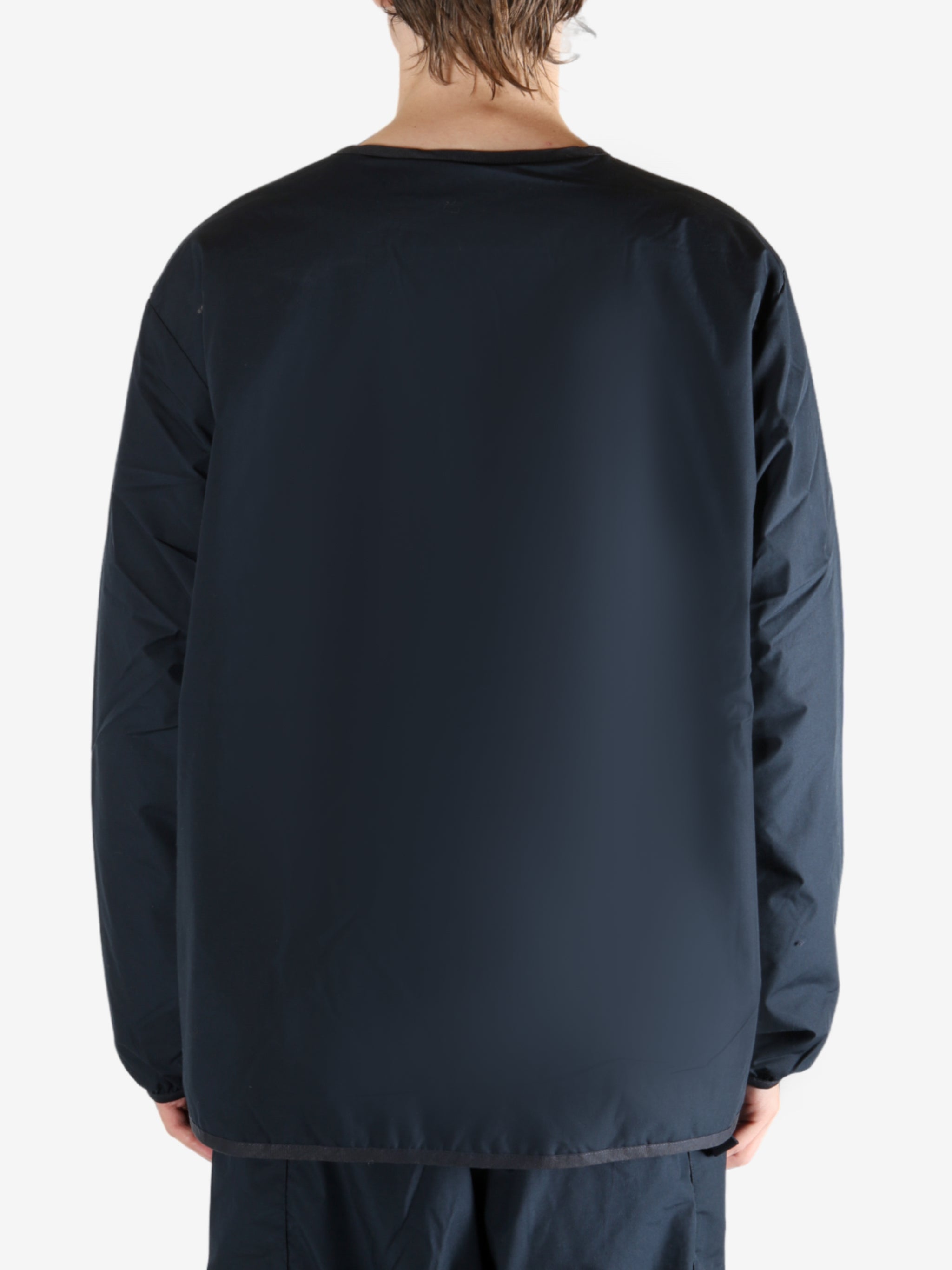 Navy cardigan worn by a person, showing the cardigan's fit