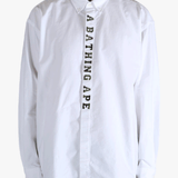 White shirt worn by a person, showing the shirt's fit