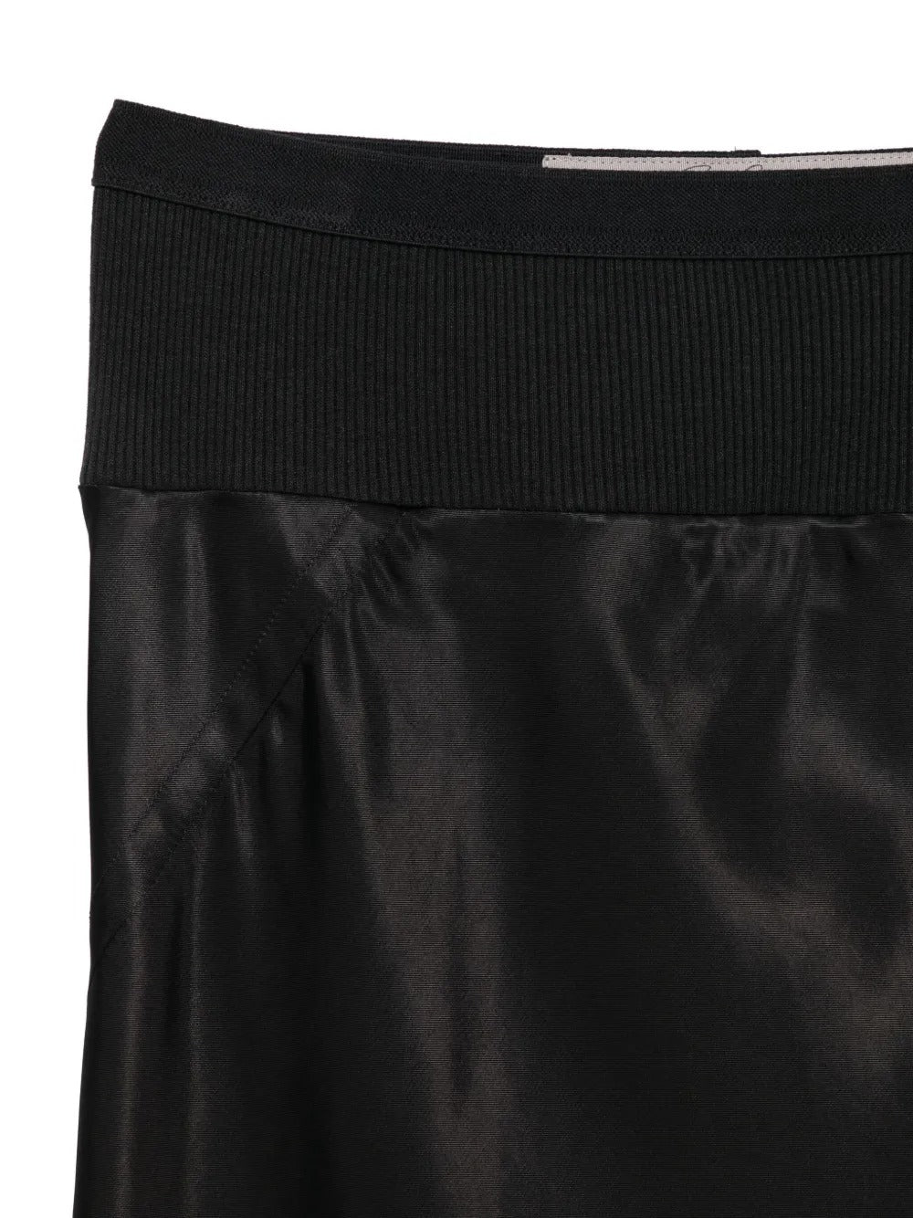 Close up of black skirt, showing texture of the cupro fabric