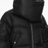 Black jacket worn by a person, showing the jacket fit