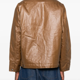 Brown jackets worn by a person, showing the jackets fit