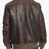 Brown jacket worn by a person, showing the jacket's fit