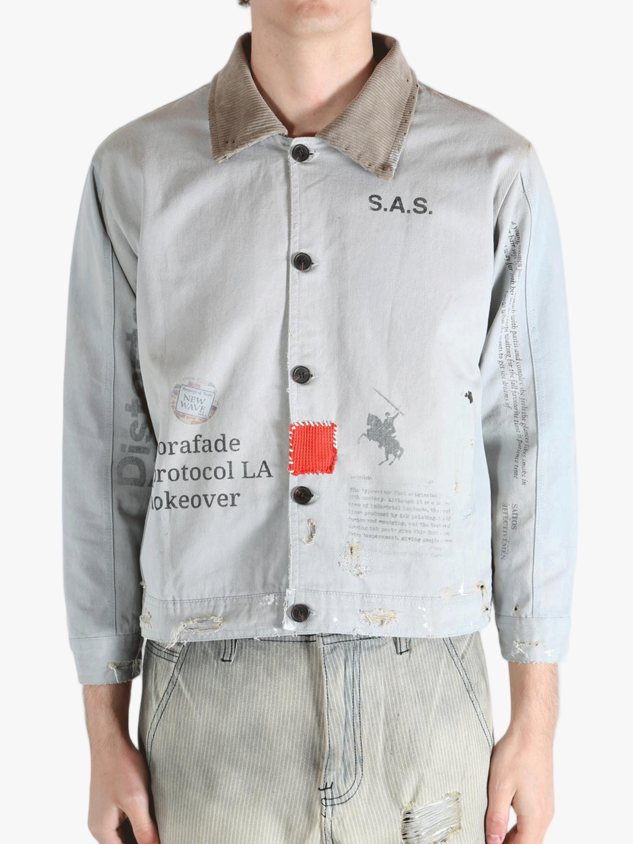 Grey jacket worn by a person, showing the jacket's fit