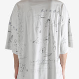 Grey T-shirt worn by a person, showing the T-shirt's fit