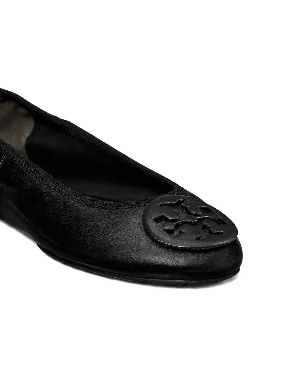 Close up of black sandals , showing texture of the calf leather fabric