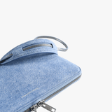 Close up of the blue bag, showing texture of the cotton fabric