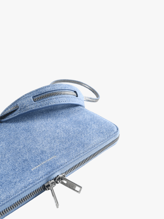 Close up of the blue bag, showing texture of the cotton fabric