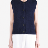 Navy top worn by a person, showing the top fit