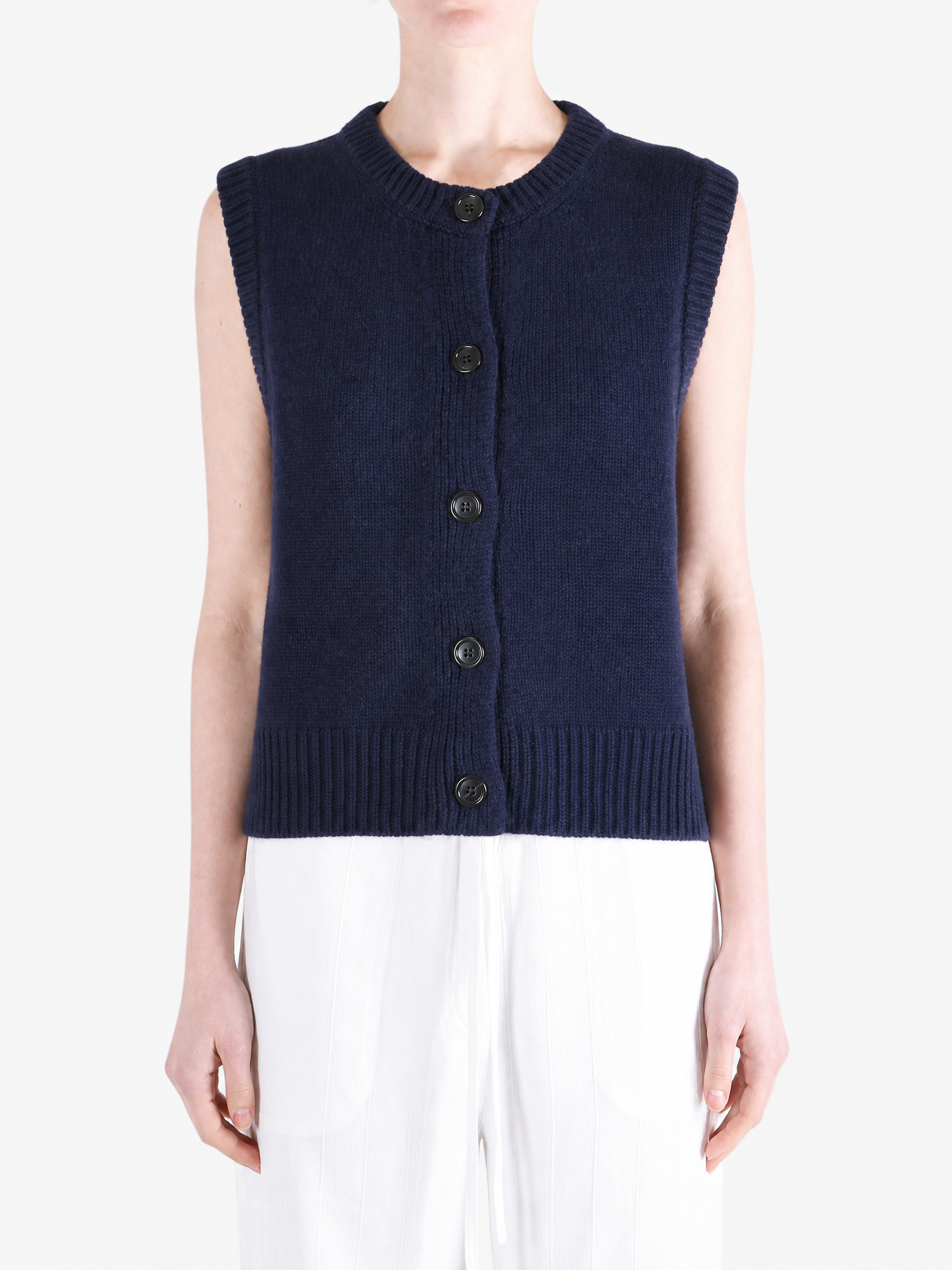 Navy top worn by a person, showing the top fit