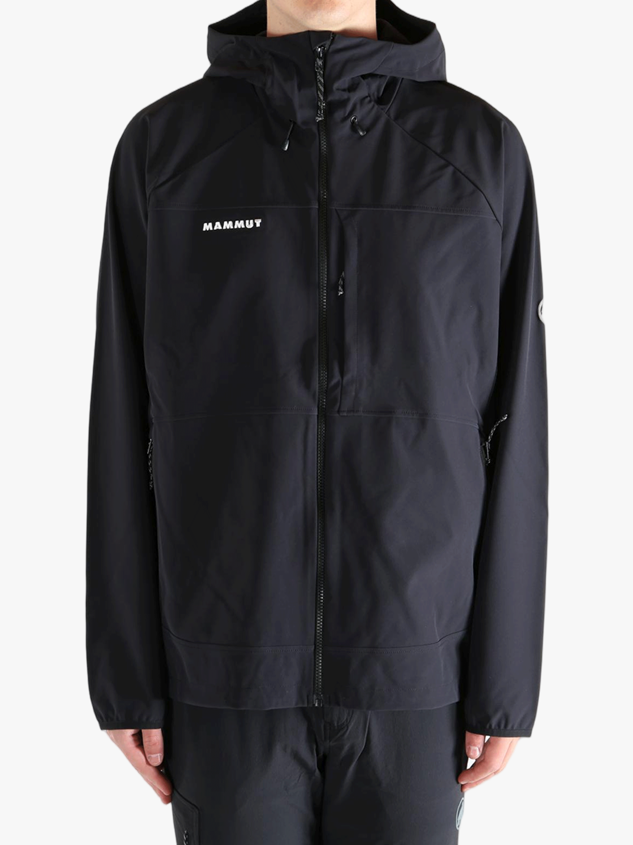 Black jacket worn by a person, showing the jacket's fit