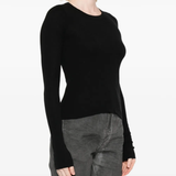 Black shirt worn by a person, showing the shirt fit