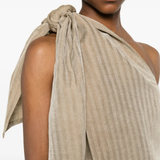 Close up of the tan jacktes, showing texture of the blended fabric