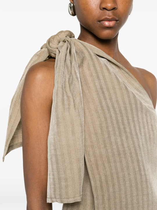 Close up of the tan jacktes, showing texture of the blended fabric