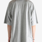 Grey t-shirt worn by a person, showing the shirt's fit