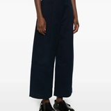 Blue pants worn by a person, showing the pants fit