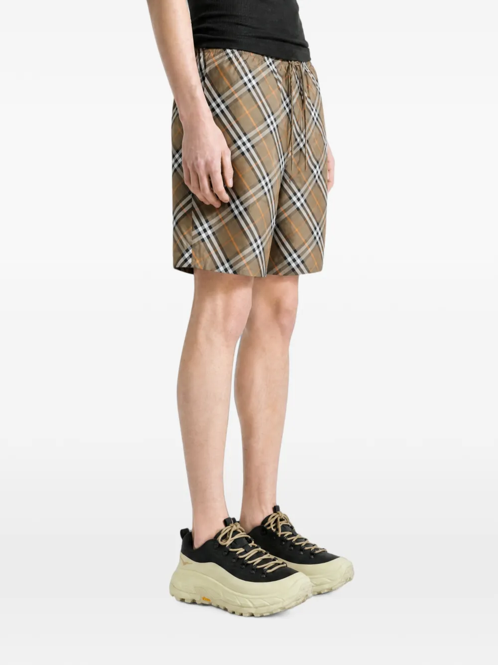 Brown shorts, full body view