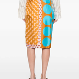 orange skirts worn by a person, showing the skirts  fit