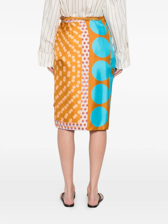 orange skirts worn by a person, showing the skirts  fit