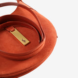 Close up of  red bag ,showing texture of the leather