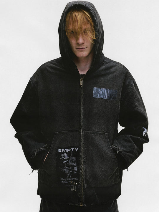 Black jacket worn by a person, showing the jacket's fit