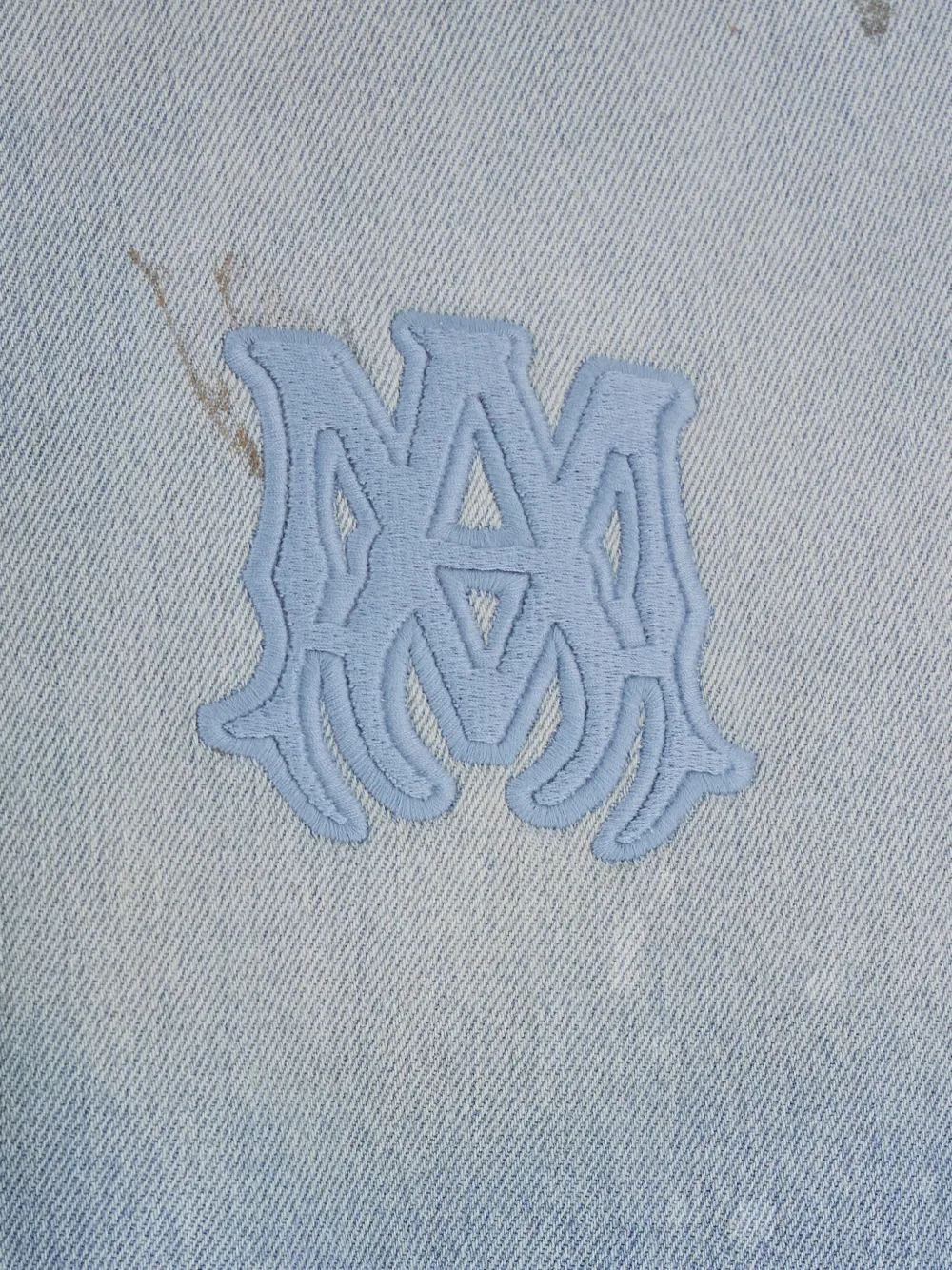 Close up of blue sweats-hoodes, showing texture of the Cotton fabric