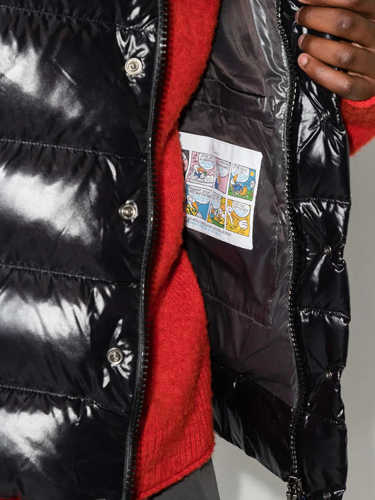 Black jacket worn by a person, showing the jacket fit