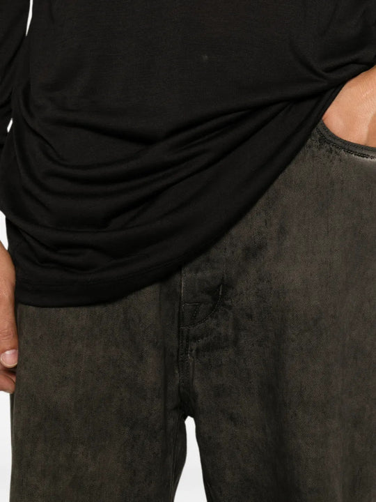 Black t-shirt worn by a person, showing the t-shirt fit