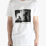 white t-shirts  worn by a person, showing the t-shirts fit