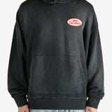 Black hoodie worn by a person, showing the hoodie’s fit