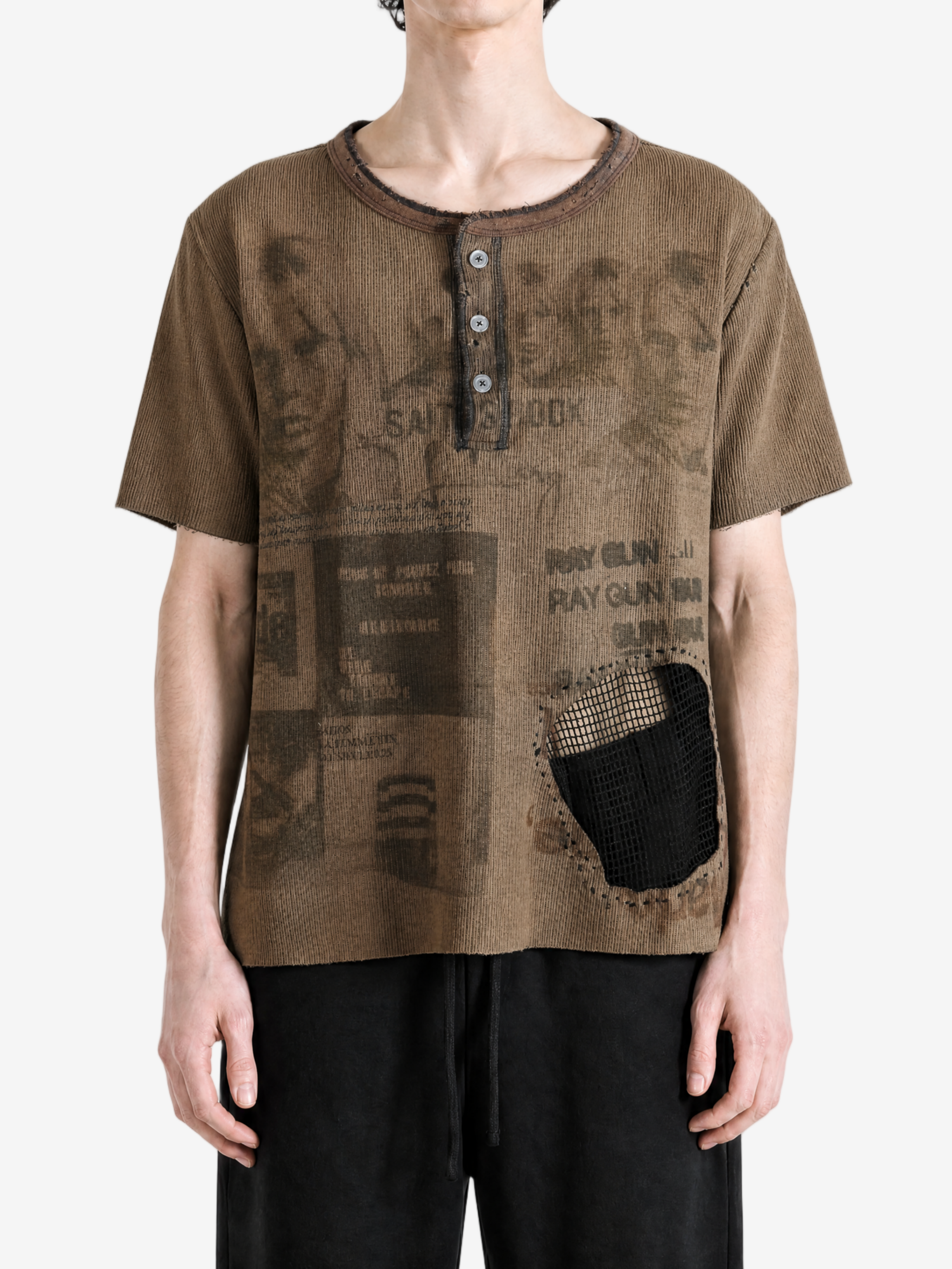 Brown t-shirt worn by a person, showing the t-shirt fit