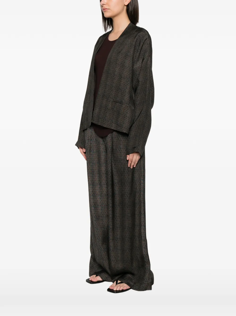 Brown jackets worn by a person, showing the jackets's fit