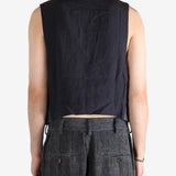 Grey waistcoat worn by a person, showing the waistcoat fit