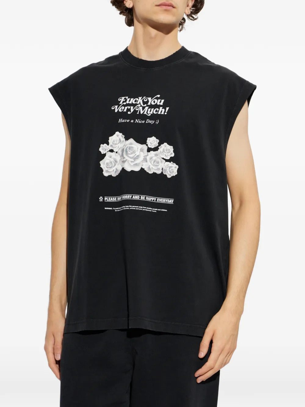 Black t-shirt worn by a person, showing the t-shirt fit