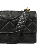 Close up of black bag, showing texture of the leather fabric