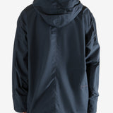 Navy jacket worn by a person, showing the jacket's fit