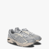 Grey sneakers, side view