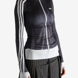 black jacket worn by a person, showing the jacket fit