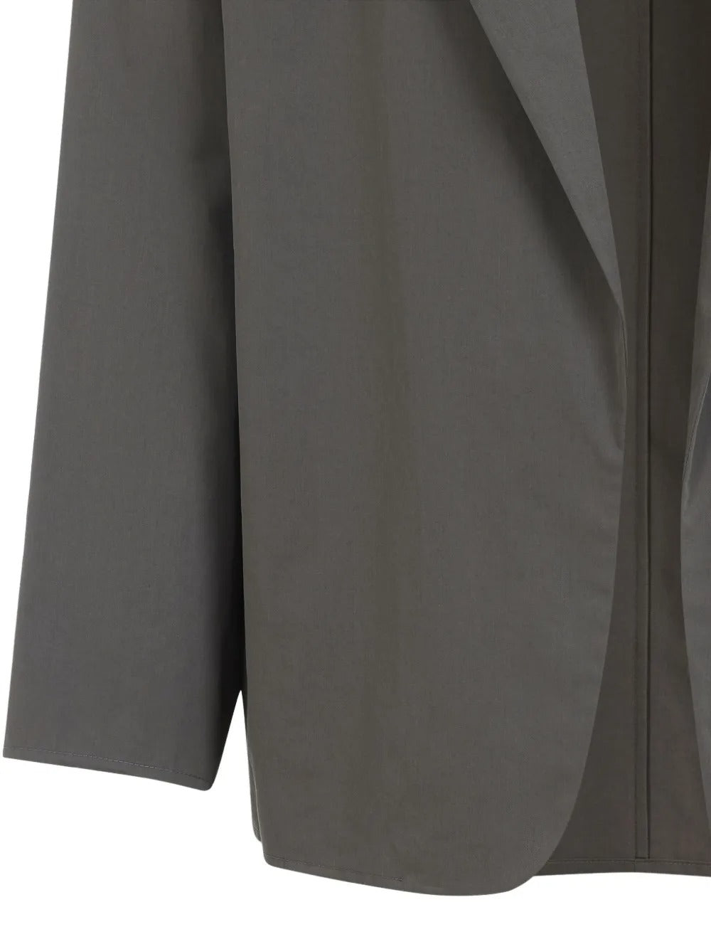 Close up of grey blazer, showing texture of the cotton fabric