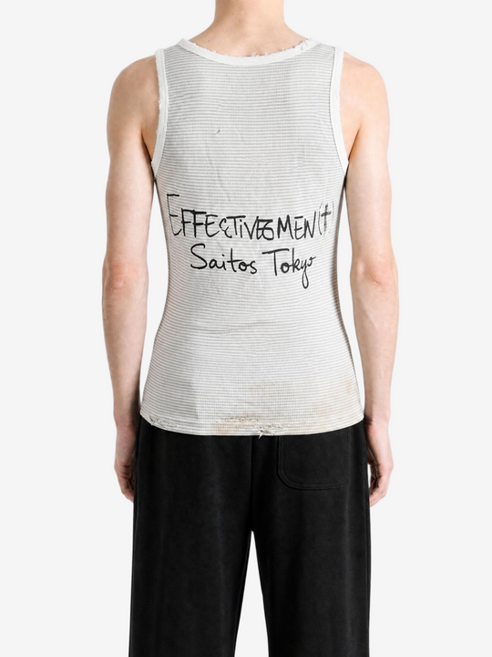 Tan t-shirt worn by a person, showing the t-shirt fit