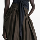 Close up of brown skirt, showing texture of the Silk fabric