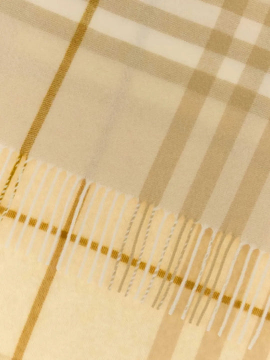 Close up of the tan scarf, showing texture of the cashmere fabric