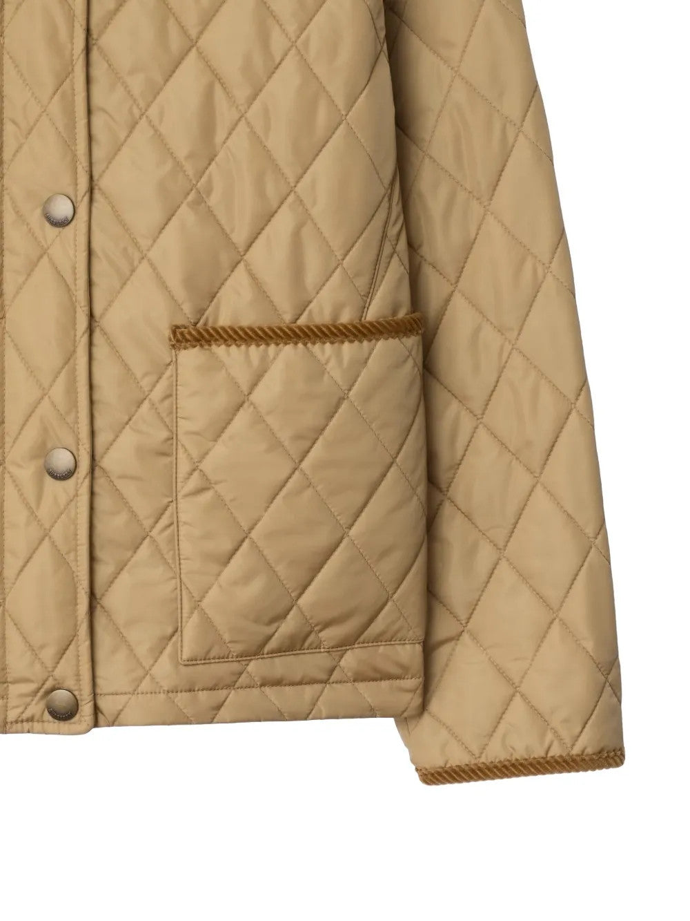 Close up of Tan jacket, showing texture of the 100% polyamide fabric