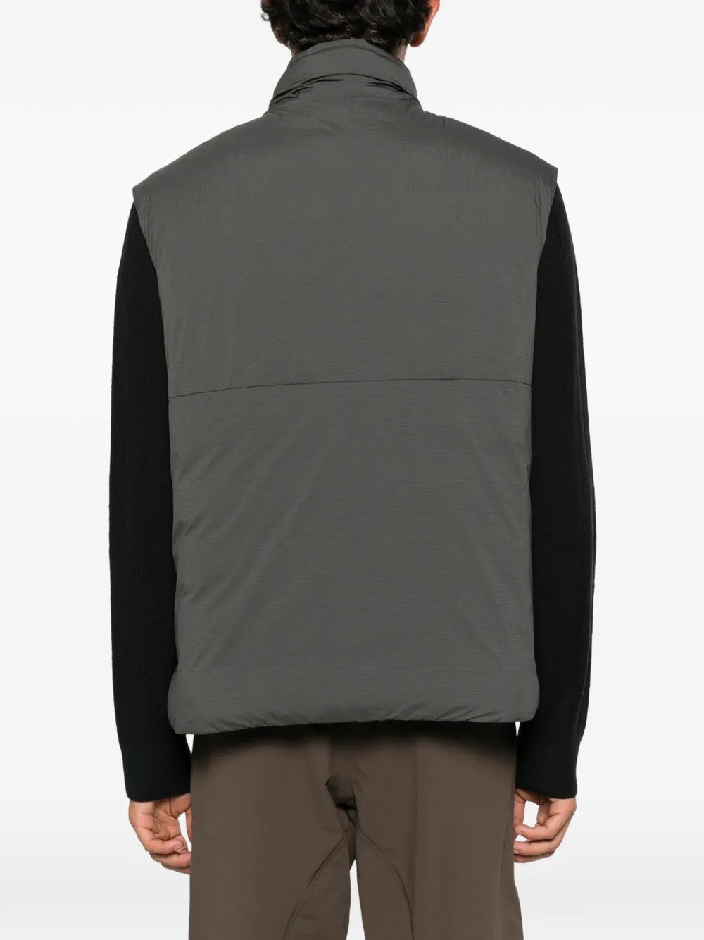 Grey jacket worn by a person, showing the jacket fit