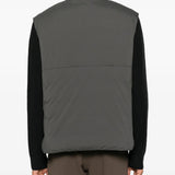 Grey jacket worn by a person, showing the jacket fit