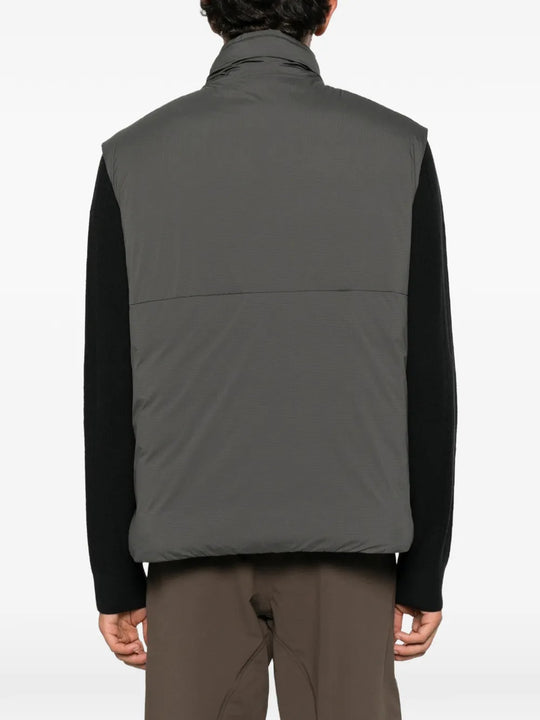 Grey jacket worn by a person, showing the jacket fit